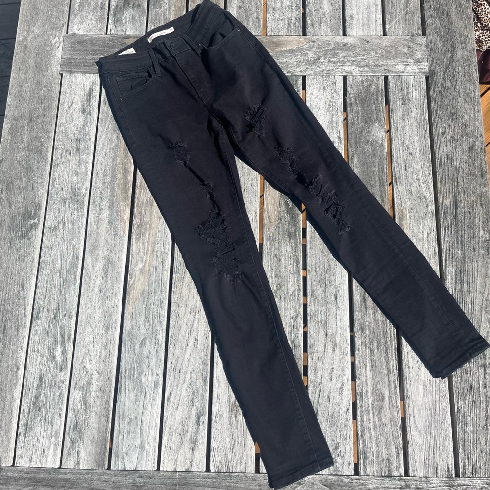 Levi’s Distressed Black Denim Skinny Jeans